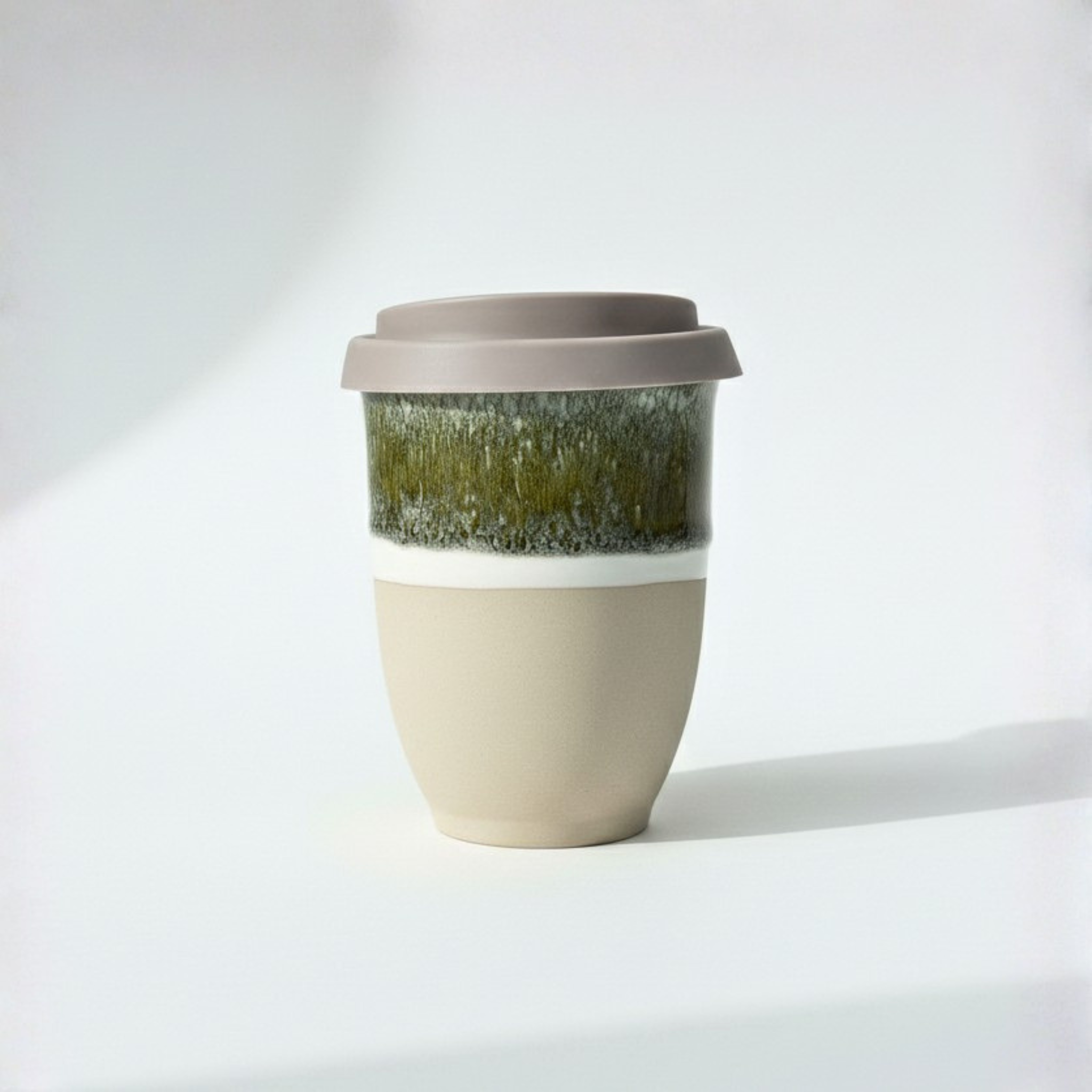 Black Forest Classic ceramic travel cup in deep forest green, 8oz, with silicone lid
