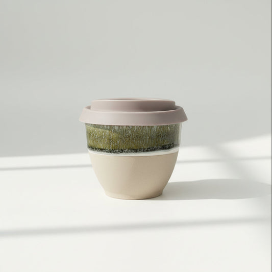 Black Forest Primo ceramic travel cup in deep forest green, 6oz, with silicone lid