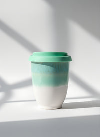 Bridgetown Classic ceramic travel cup in mint green and white, 8oz, with silicone lid
