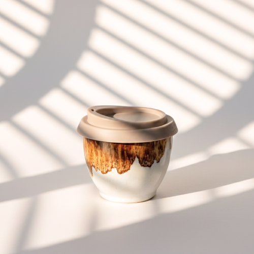 byfrow x Glaze Primo ceramic travel cup in creamy white and coffee tones, 6oz, with silicone lid